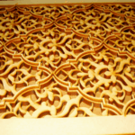 Laser cut intricate pattern out of 1/8 inch and 1/2 inch thick MDF, glued together for profile Custom Wood Grille