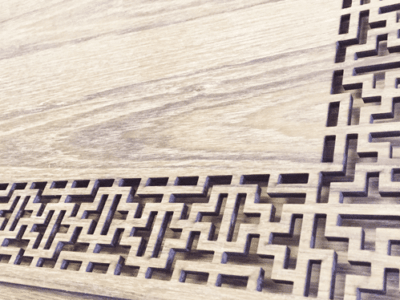 Laser cut 1-inch-thick solid hardwood
