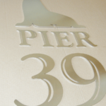 laser cut Pier 39 logo using 1/8 inch thick aluminum and cardboard installation template Pier 39 logo