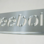 Custom logo cut from thin stainless steel Custom logo cut from thin stainless steel
