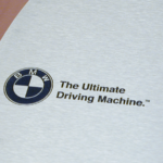 Laser etch BMW logo on 1/4 inch thick brushed aluminum disc laser etch aluminum disc