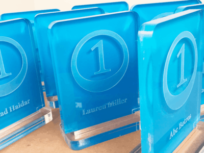 laser engrave custom name display using 1/2-inch-thick clear acrylic with blue vinyl backing