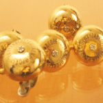 Laser etch texts on brass bicycle bells Laser etched texts on brass bells