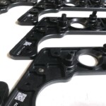 Laser engrave anodized aluminum parts