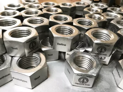 Laser etch on hexagon stainless steel nuts Laser etch on hexagon stainless steel nuts
