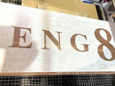 laser engrave 6ft oak bench for a fire station in San Jose